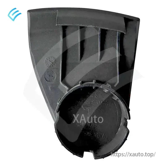 Rear view of grey lug nut cover with circular snap ring and molded plastic reinforcement
