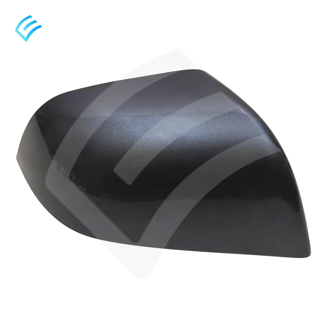 Stealth grey passenger-side mirror skull cap cover, smooth outer surface close-up