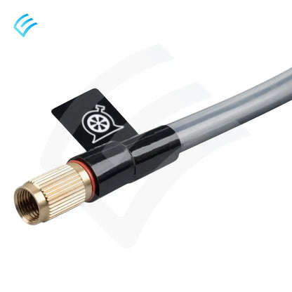 Close-up of threaded brass tire valve connector on sealant hose with wheel icon tag