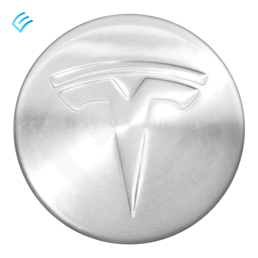Tesla OEM wheel center cap 6005879-00-A, brushed silver face with embossed T logo