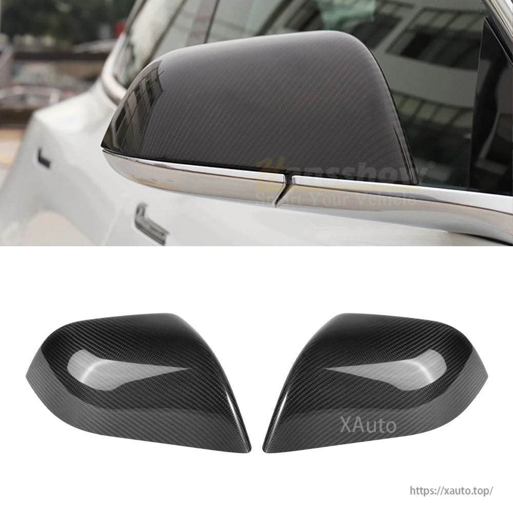 Carbon fiber mirror cover on white Tesla plus pair shown below on white background