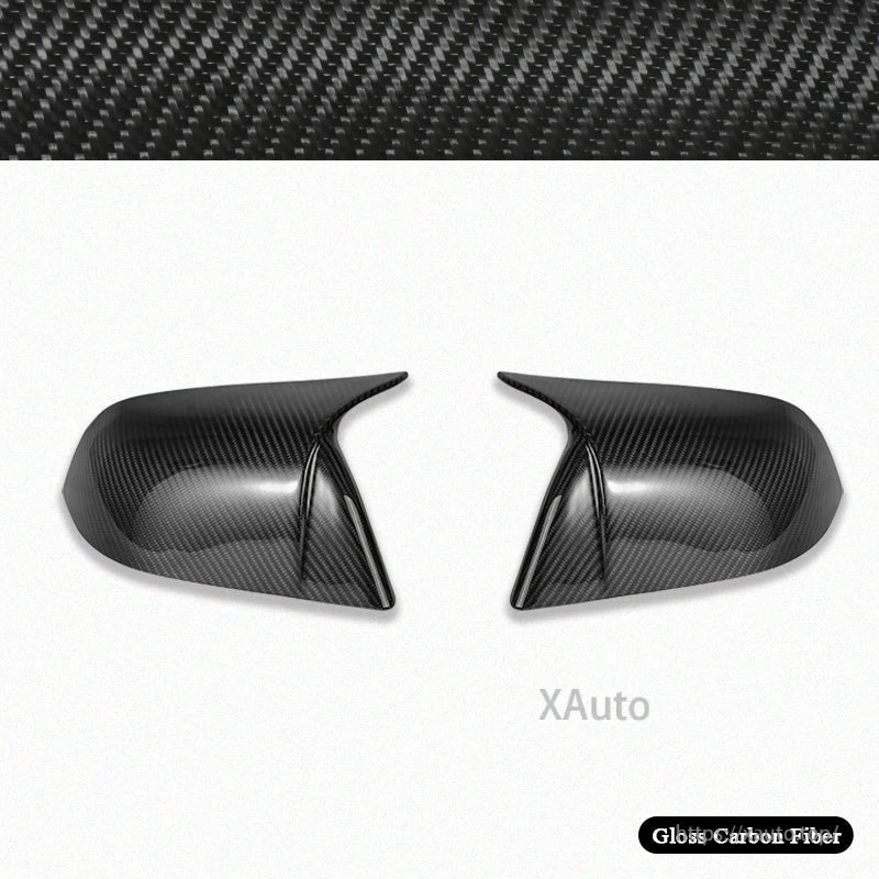 Gloss carbon fiber mirror covers shown from inner side angle, highlighting sharp outer ridge
