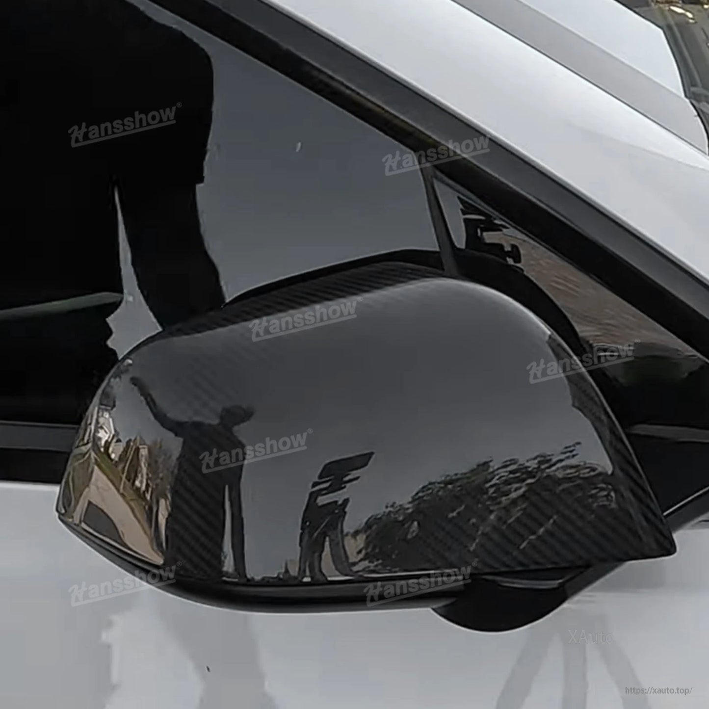 Gloss carbon fiber mirror cover installed view showing lower edge and front tip alignment
