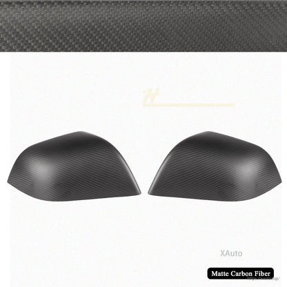 Pair of matte carbon fiber mirror covers on white background with texture banner