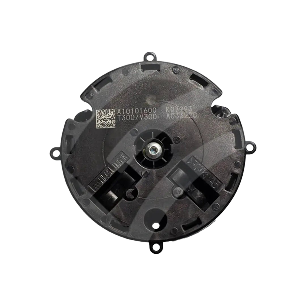 Outside mirror actuator assembly front view, round black housing with center drive and mounting tabs