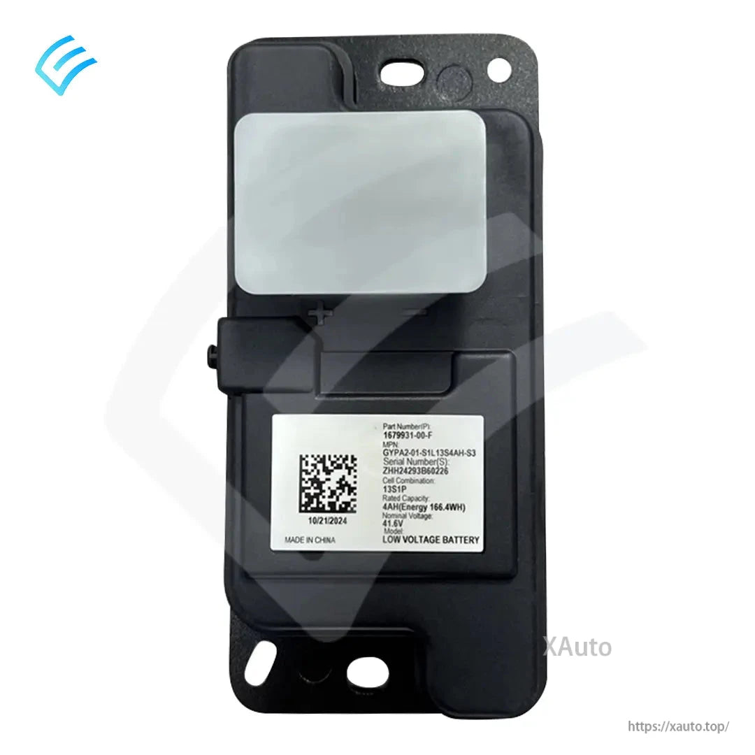 Rear view showing Tesla OEM part label for low-voltage battery, part 1679931-00-F