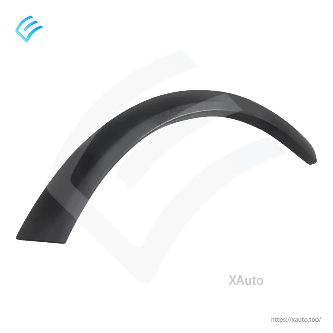 Close-up of the wheel arch cladding curve and edge finish, matte black exterior