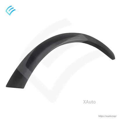 Close-up of the wheel arch cladding curve and edge finish, matte black exterior