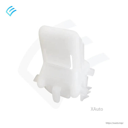 Rear view of white plastic seat bolster clip showing mounting feet and backplate shape
