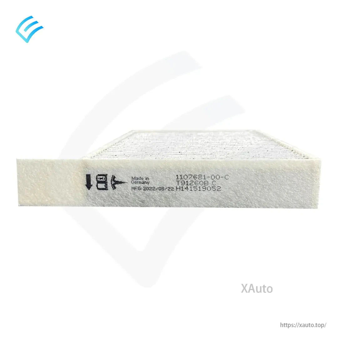 Filter frame label with airflow arrow and part number 1107681-00-C on Tesla cabin filter