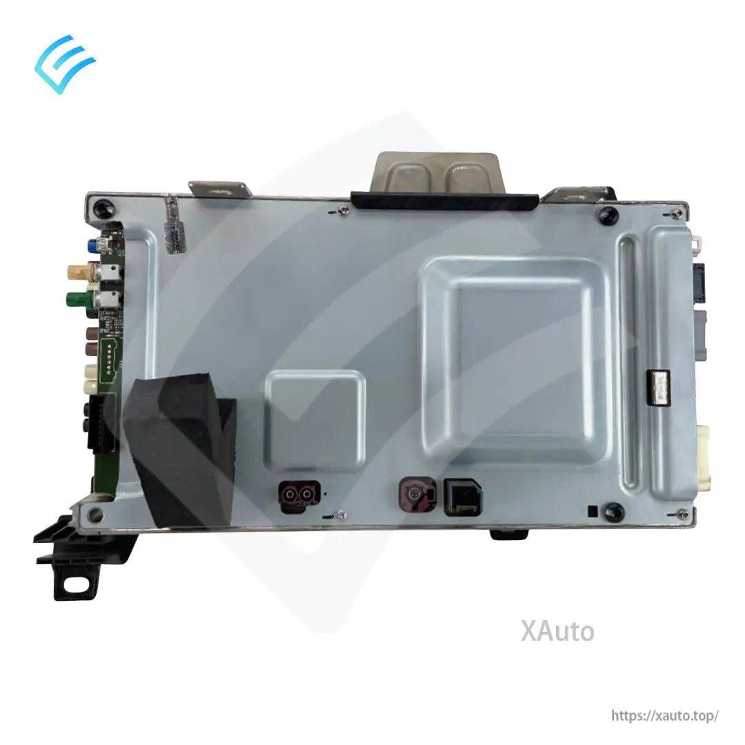 Underside metal housing view of the car computer module with mounting tabs and side circuit board