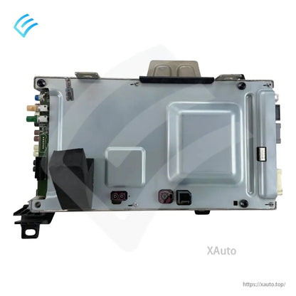 Underside metal housing view of the car computer module with mounting tabs and side circuit board
