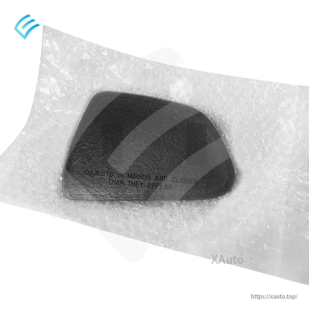 Tesla Model 3 right-hand exterior mirror glass wrapped in protective foam packaging
