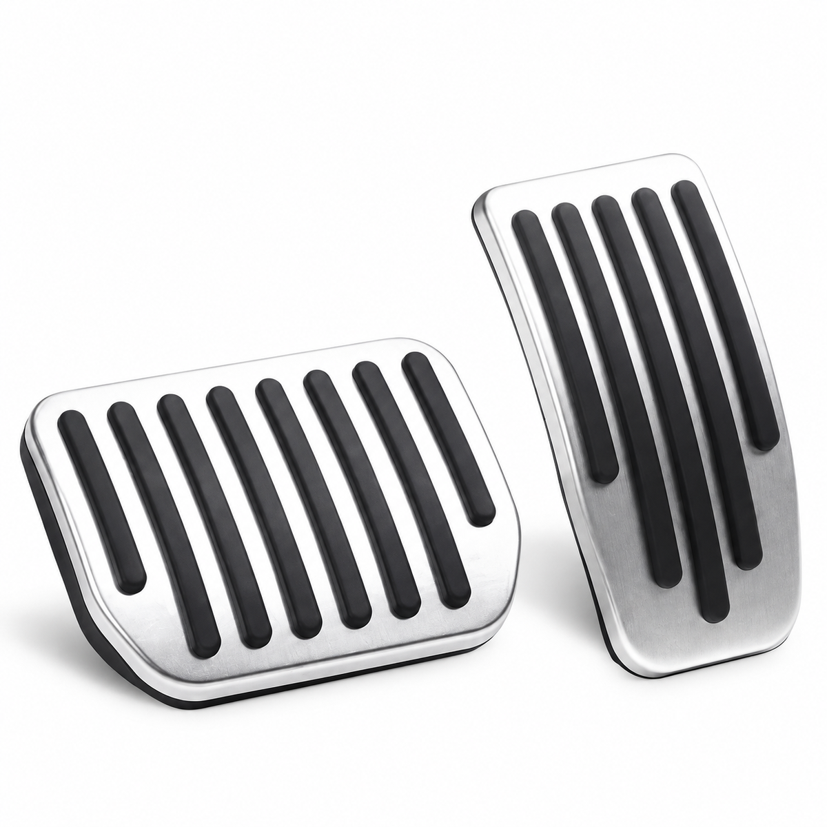 Silver aluminum brake and accelerator pedal cover set on a white background